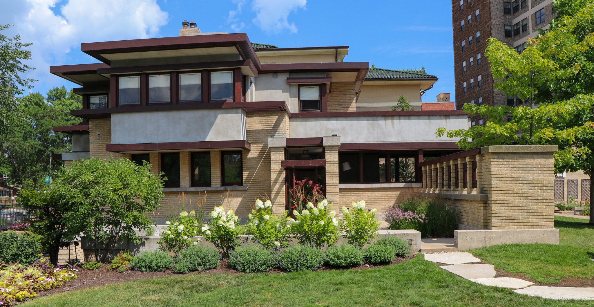 Exterior of Frank Lloyd Wright’s Bach House, showcasing Prairie style architecture and Japanese influences, as discussed by author Bob Hartnett in Frank Lloyd Wright’s $10,000 Home.