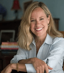 Portrait of Christine Wolf, award-winning journalist, co-author of Politics, Partnerships & Power, and founder of Writers’ Haven.