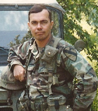 Portrait of H.W. Coyle, military veteran and bestselling author of Team Yankee and The Other Side of the Wire, known for military and historical fiction.